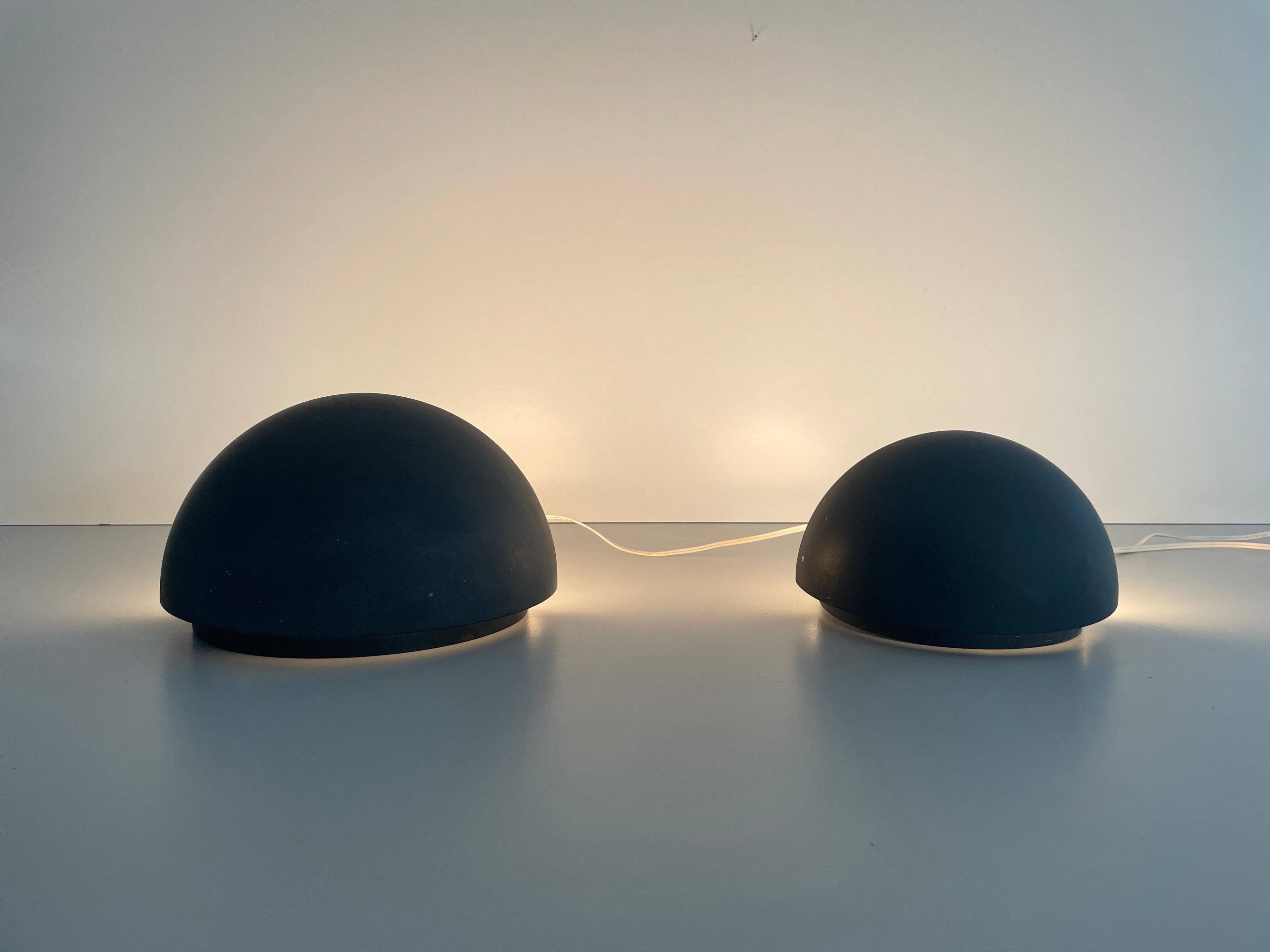 Round black metal wall lights, small and large set, by Bega, 1970s, Germany.