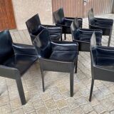 7 armchairs by Couro Brasil in Black Leather