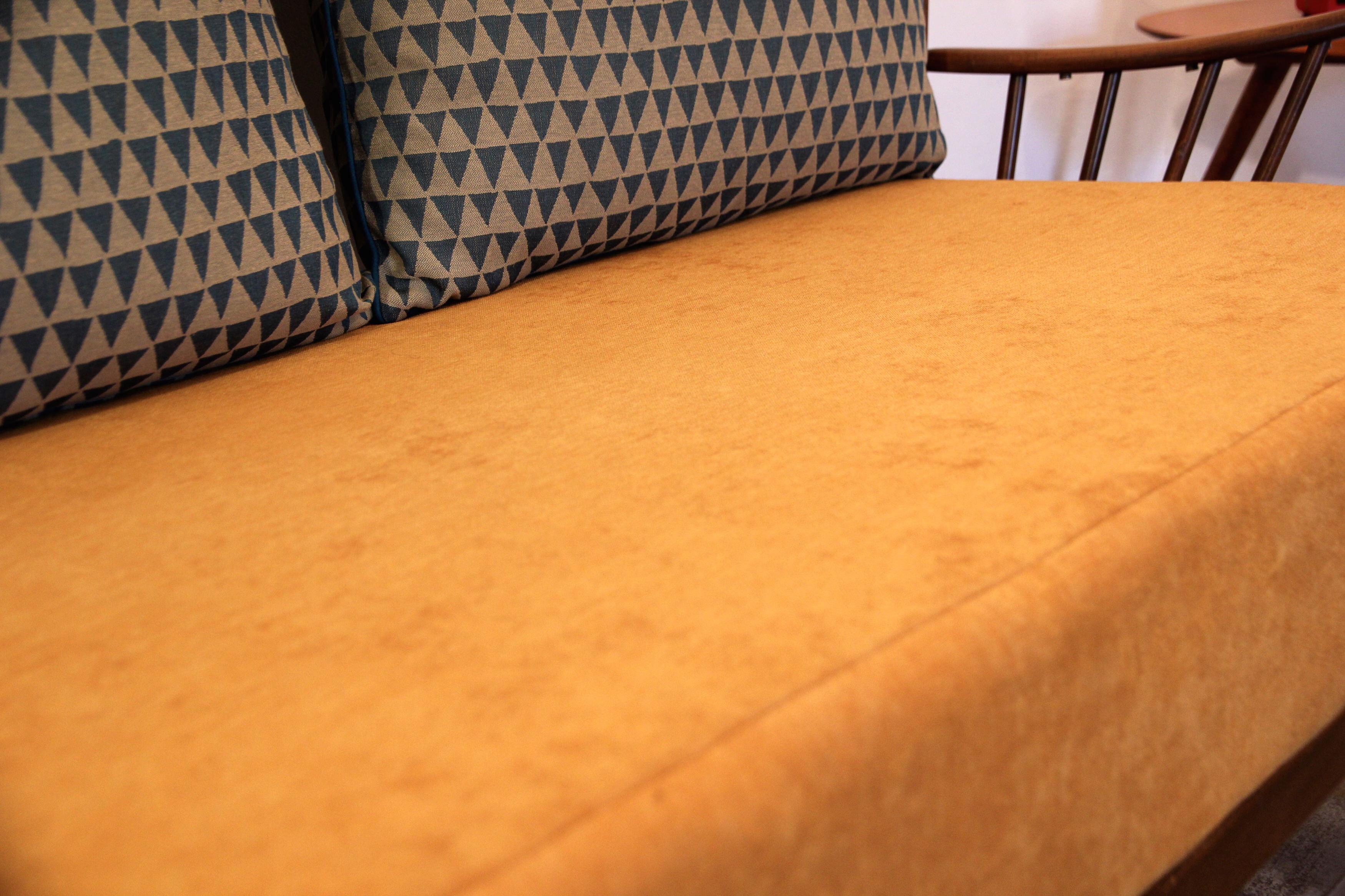 Ercol Springtime mustard yellow sofa