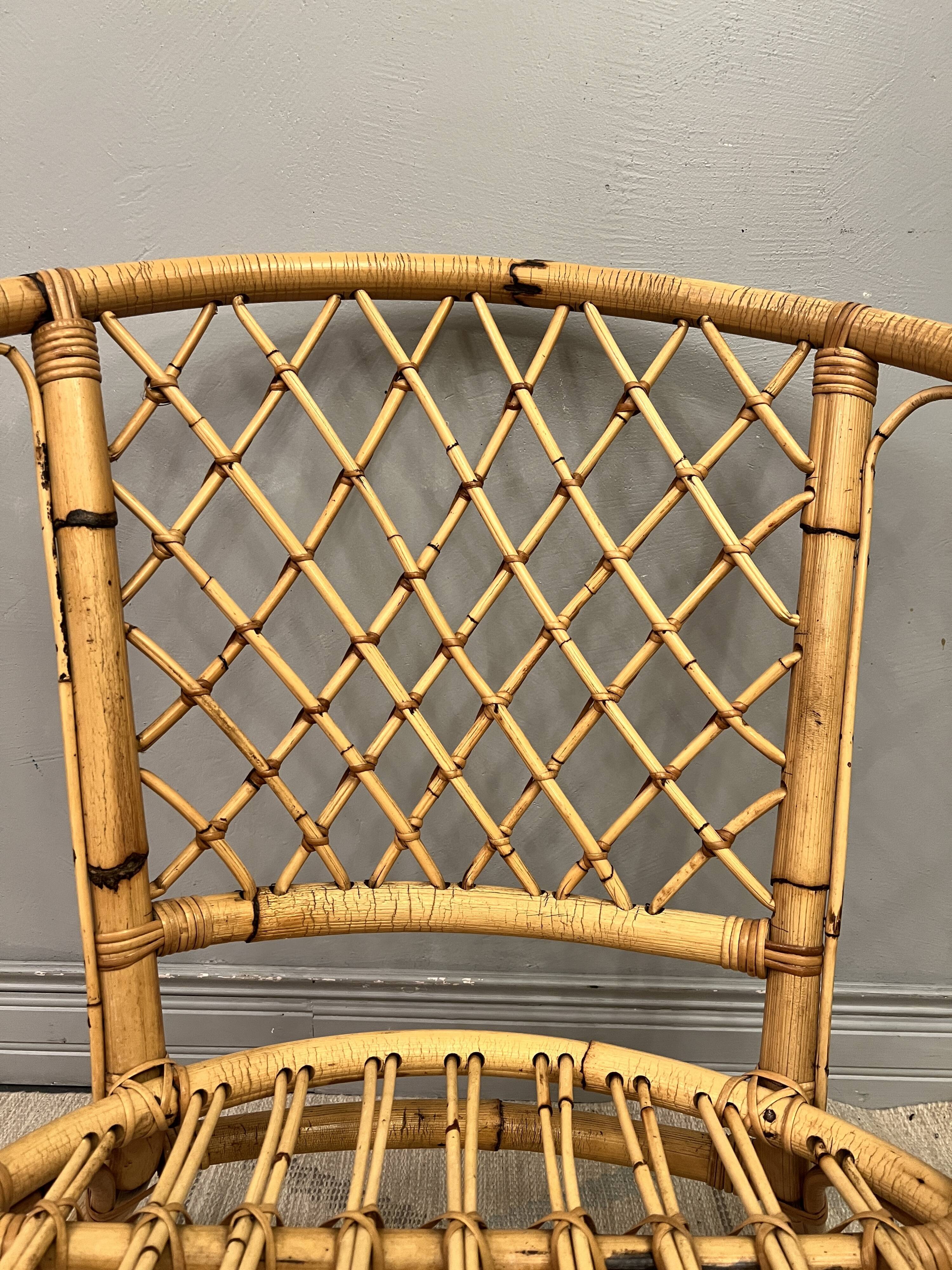 Trio of rattan armchairs