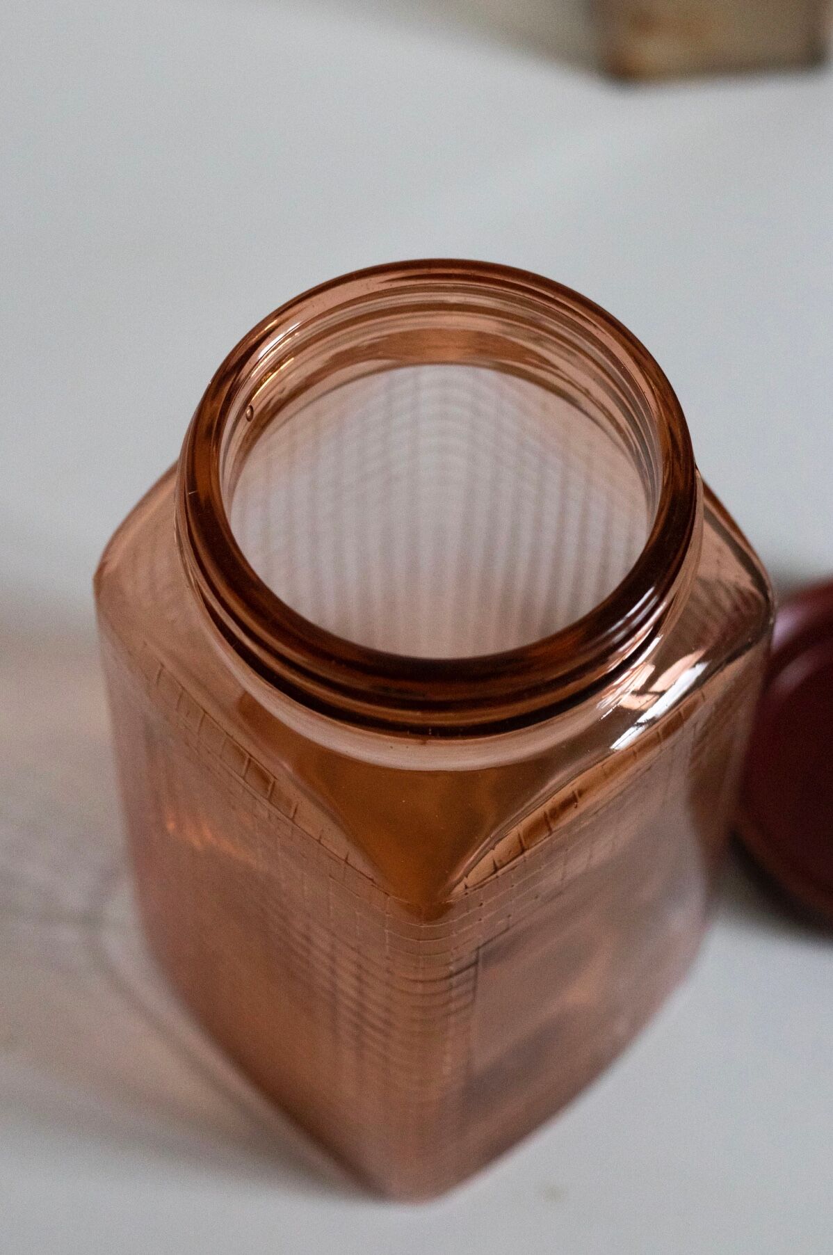 Vintage pink glass grocery jar