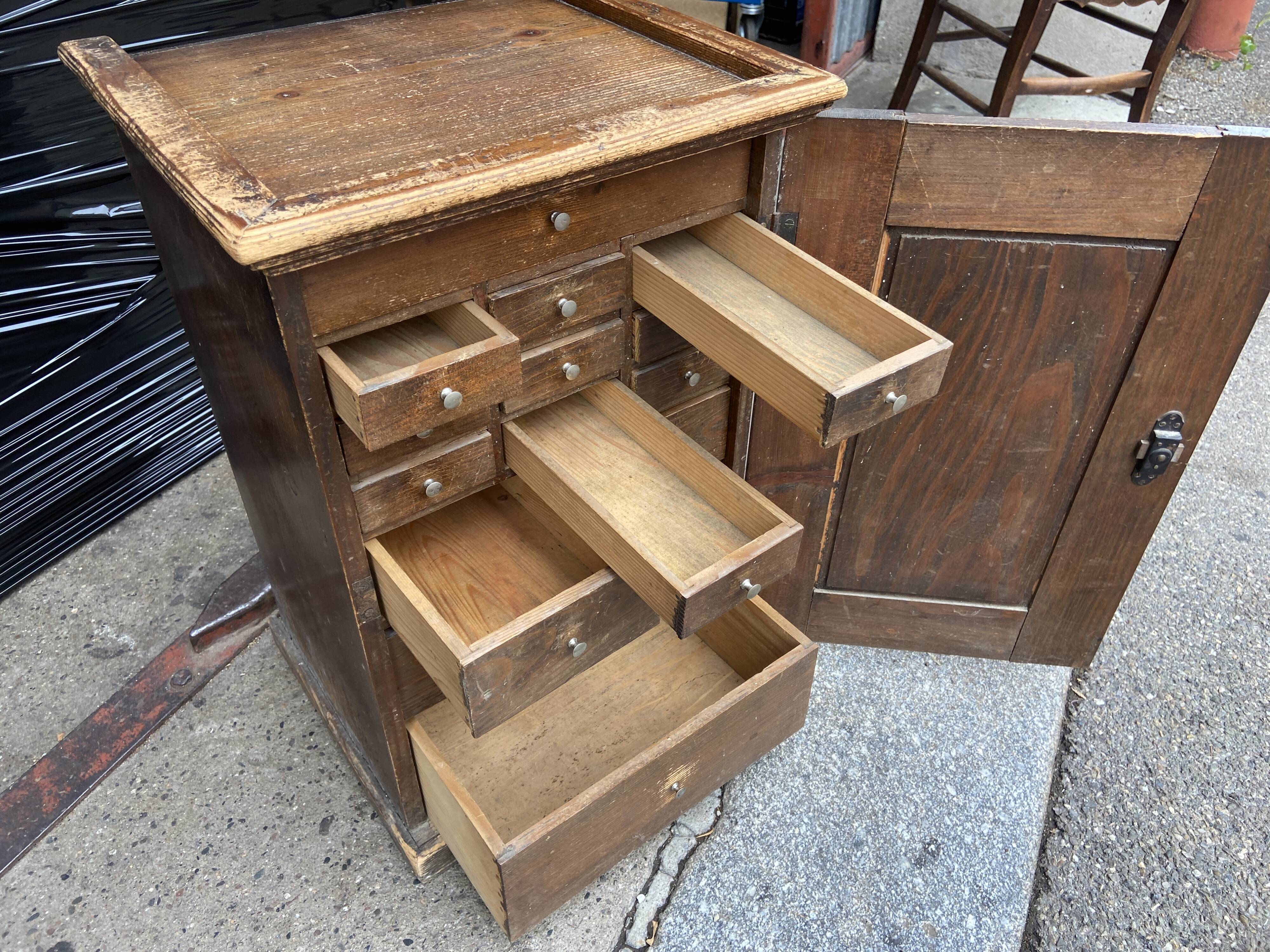 Vintage watchmaker's workshop cabinet