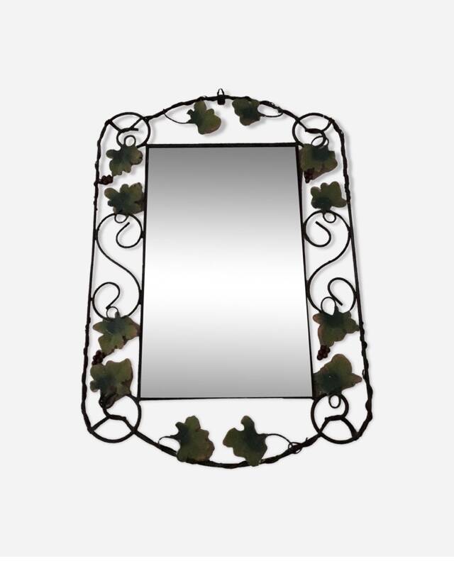 Vintage wrought iron mirror.
