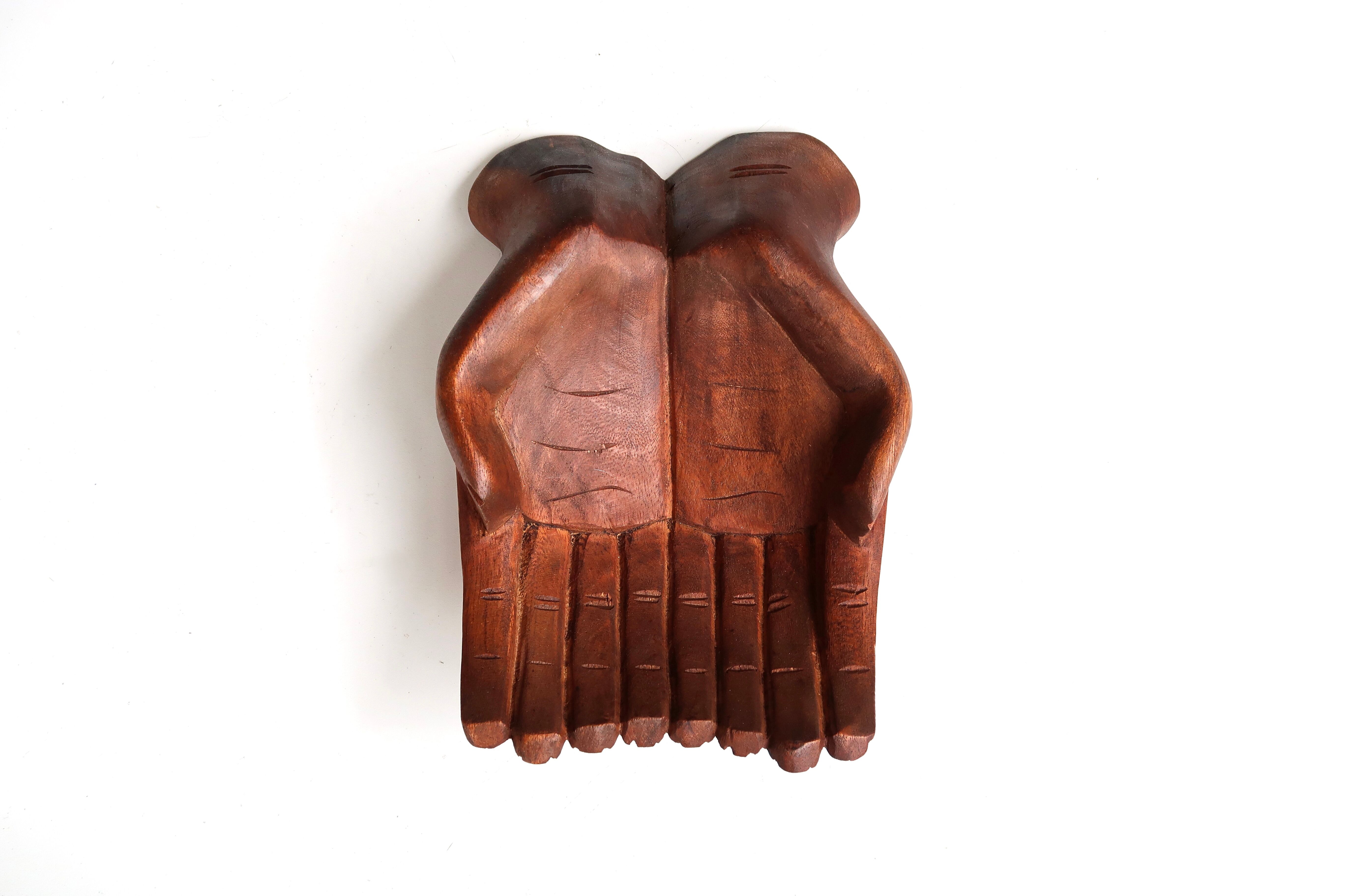 Empty pocket, hands joined in carved wood, 70s