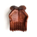 Empty pocket, hands joined in carved wood, 70s