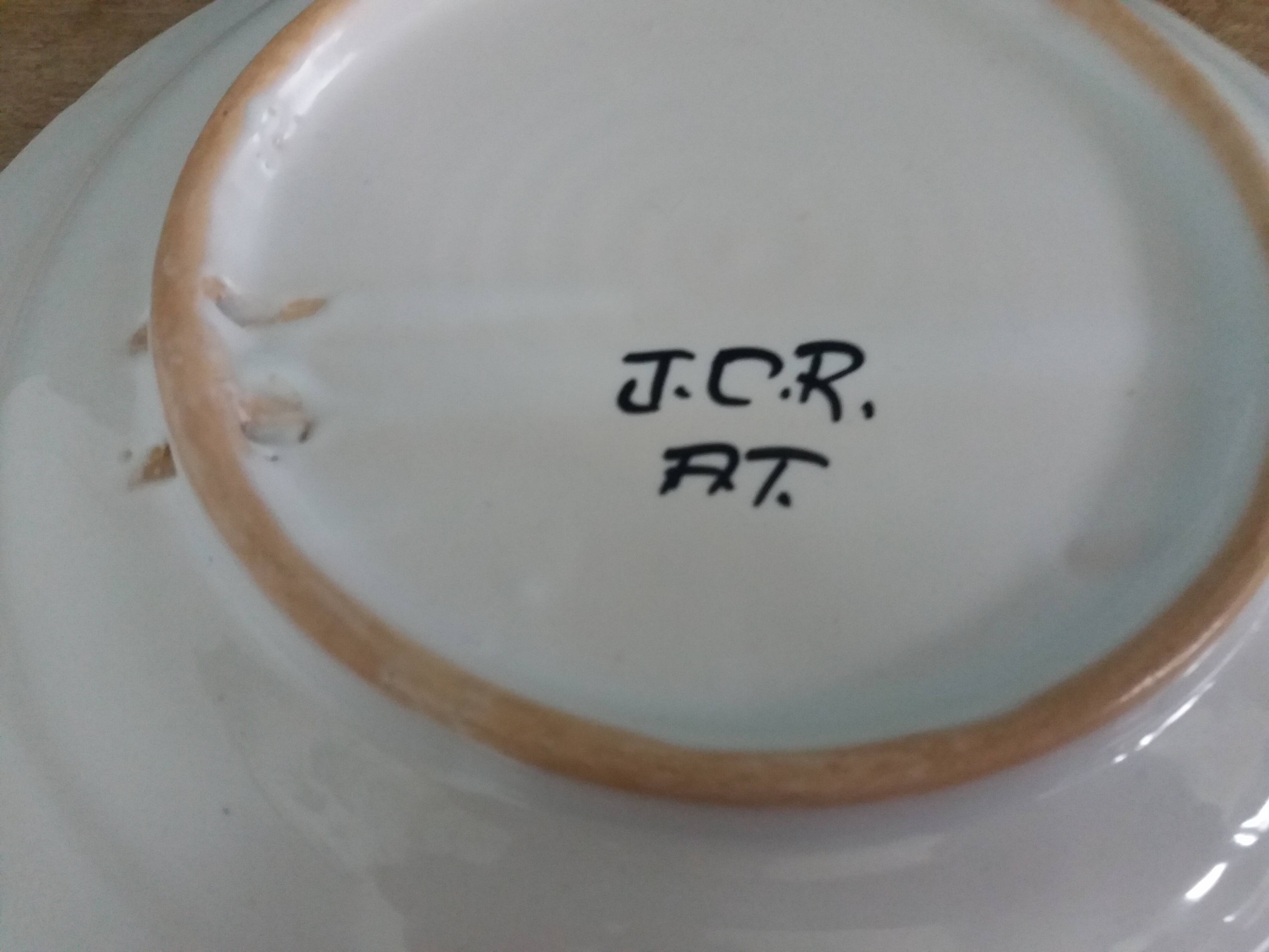 Decorative wall plate signed JCR