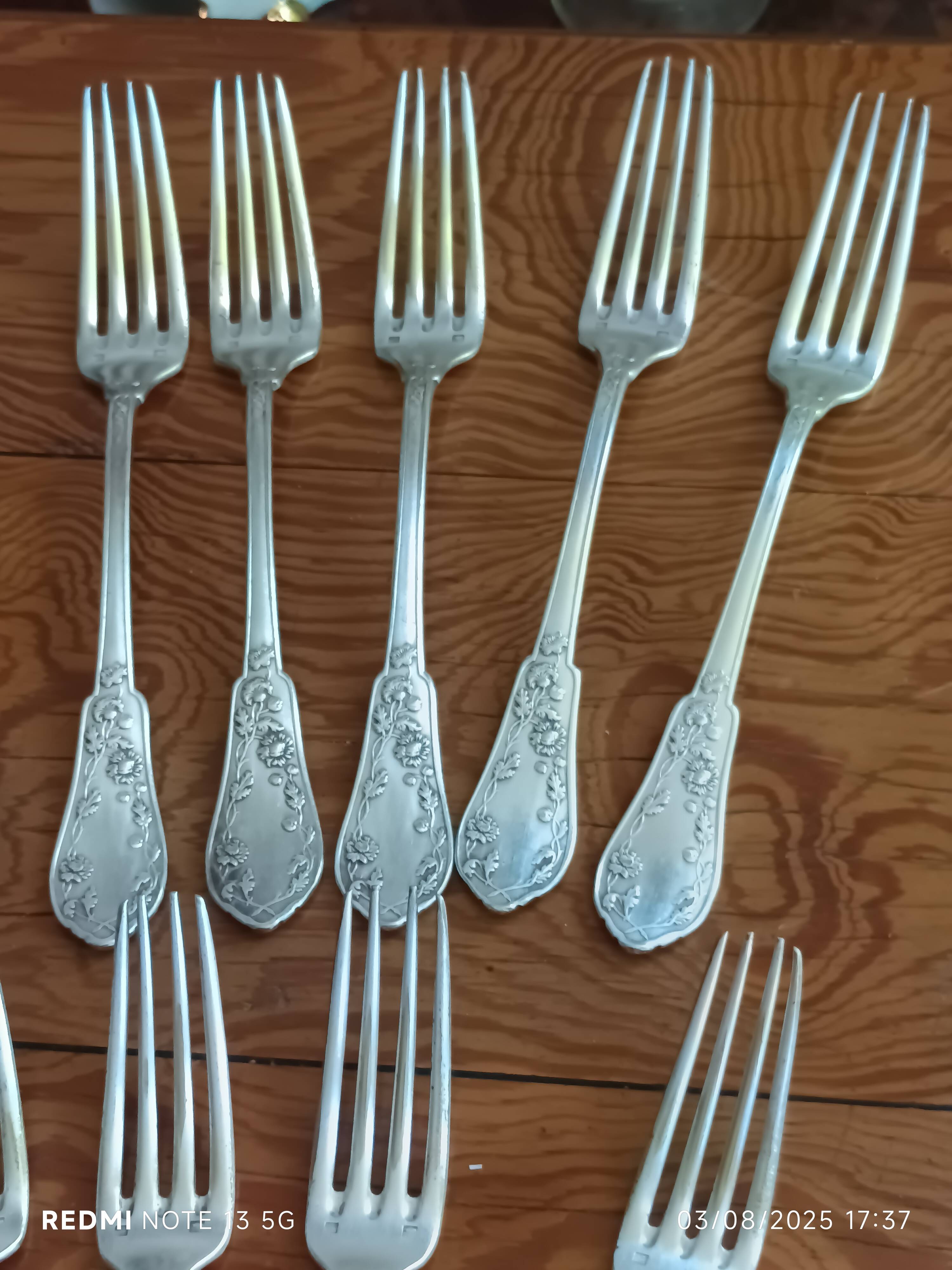 9 silver-plated Art Nouveau forks 1900-1920 with daisy decoration