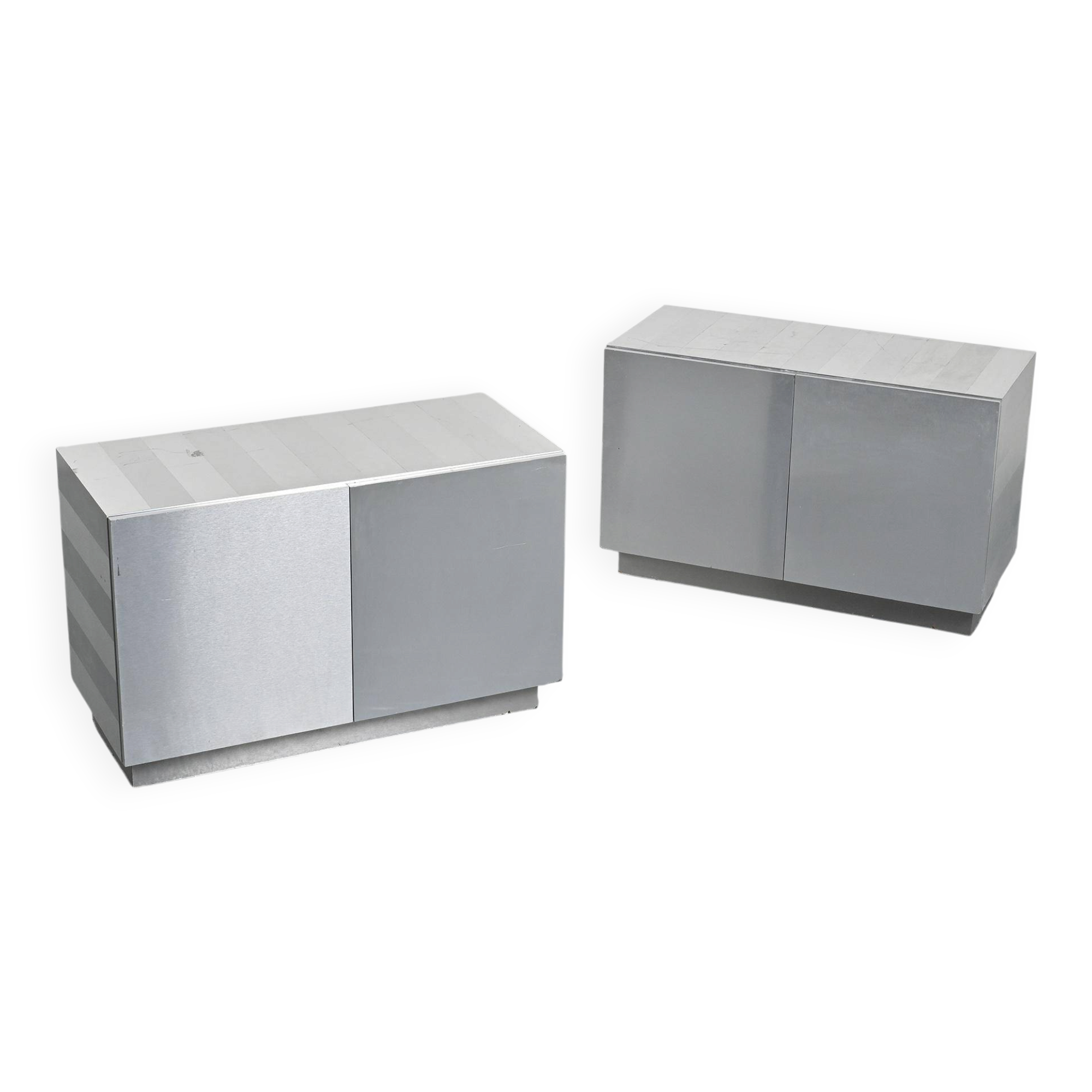 Pair of low buffets in brushed metal, French work, 1970s.