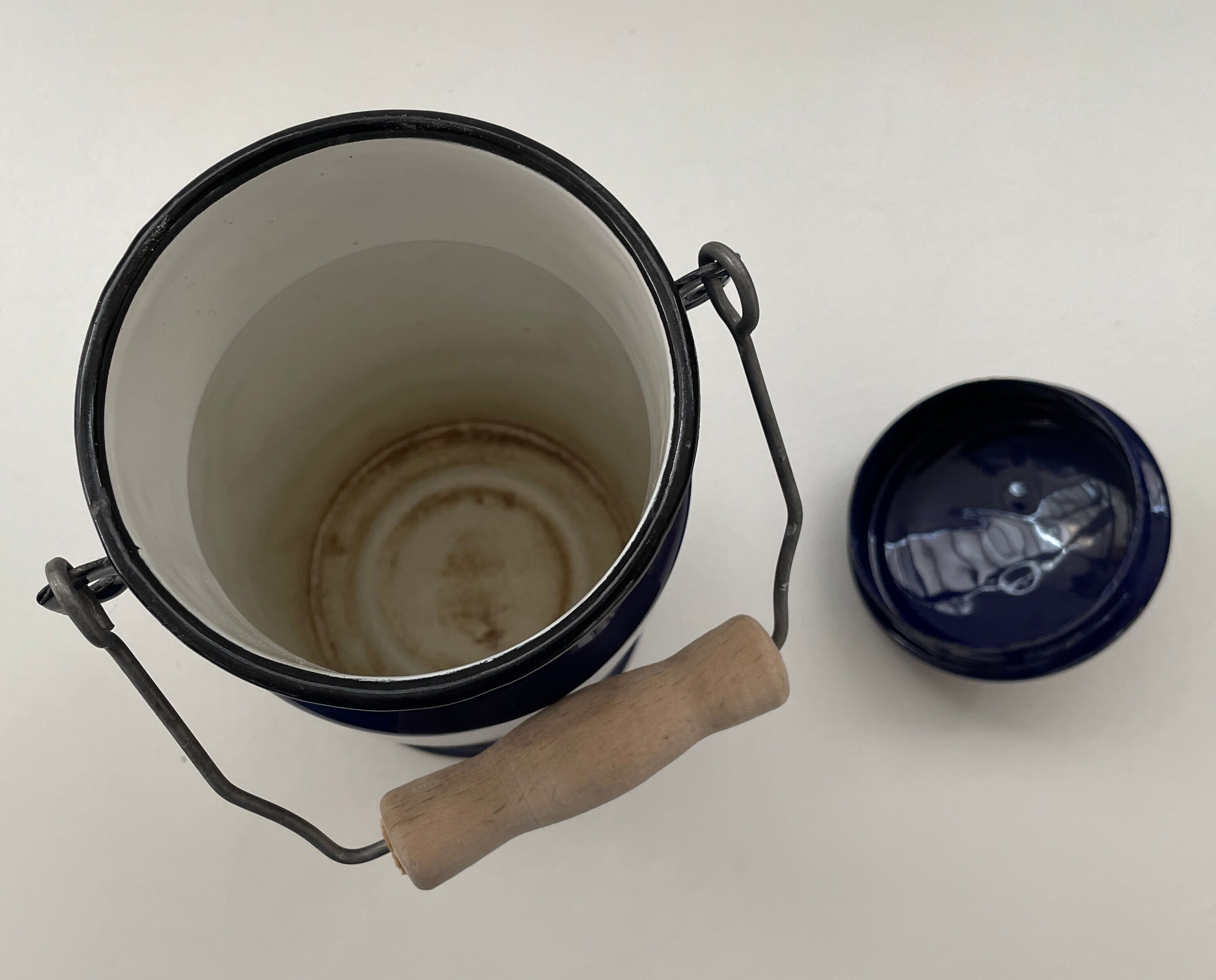 Blue enamelled milk jug