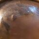 Decorative copper repoussé plate with marine motifs