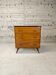Vintage commode with tapered legs