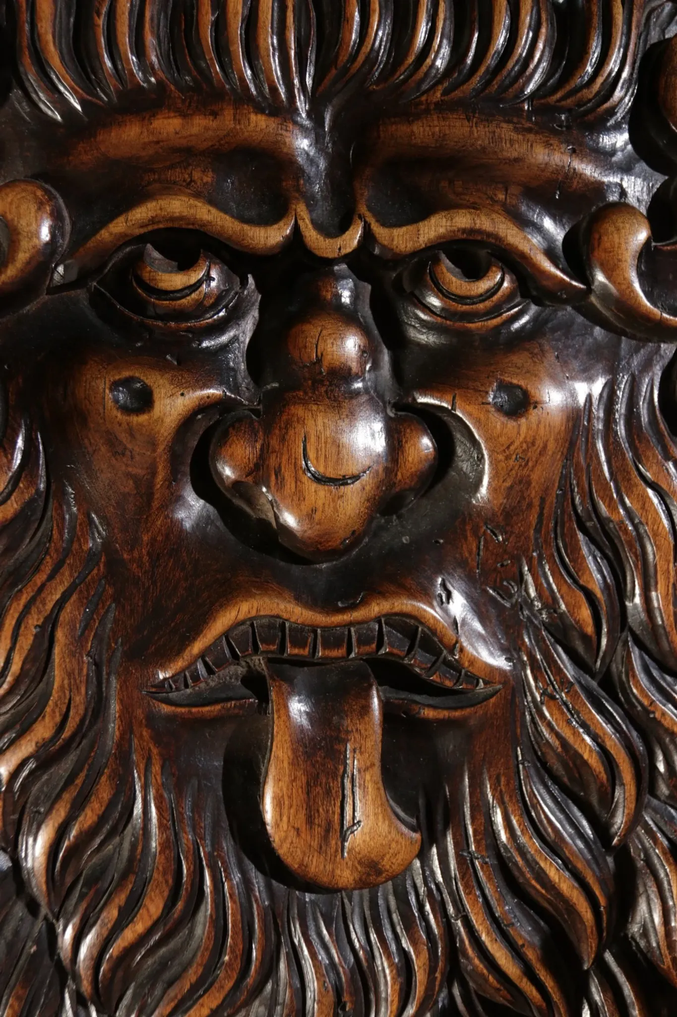 17th century Alpine carved walnut Brettstuhl armchair with grotesque mask