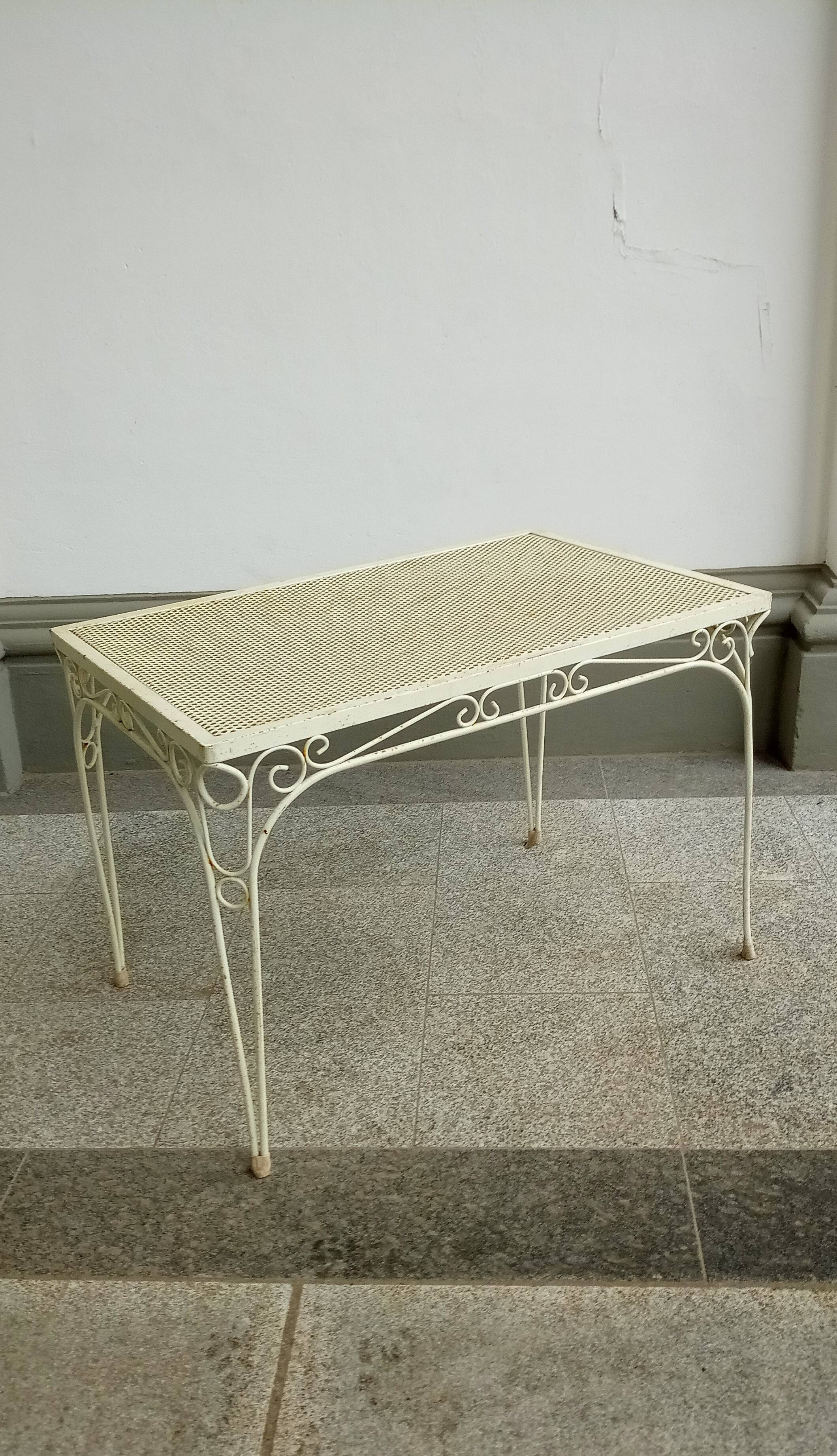 Mid century metal table in the style of mategot