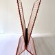 Wire metal magazine rack with triangular compartment, 1950s.