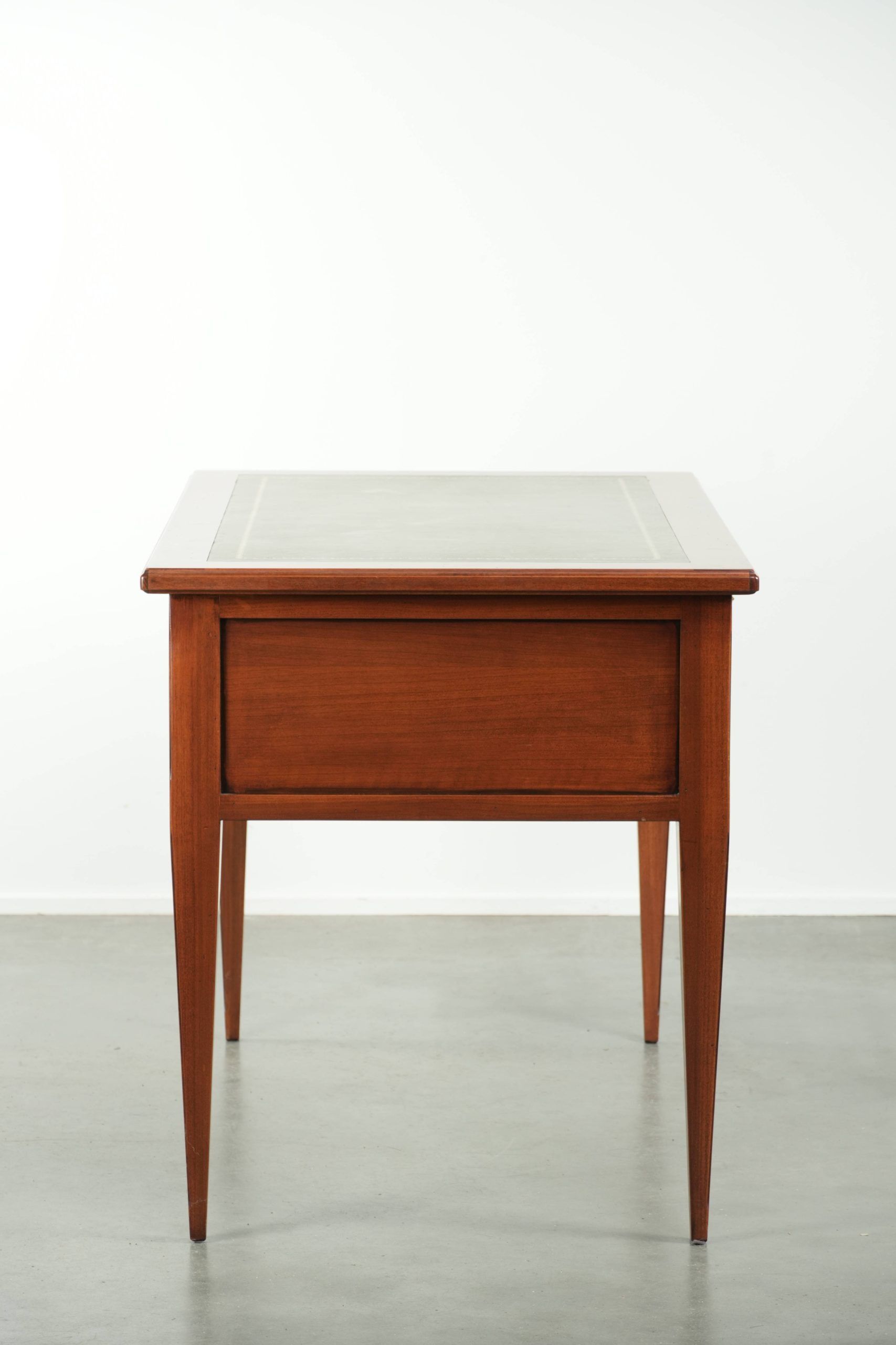 Elegant English style desk with green leather top, gold details and drawers