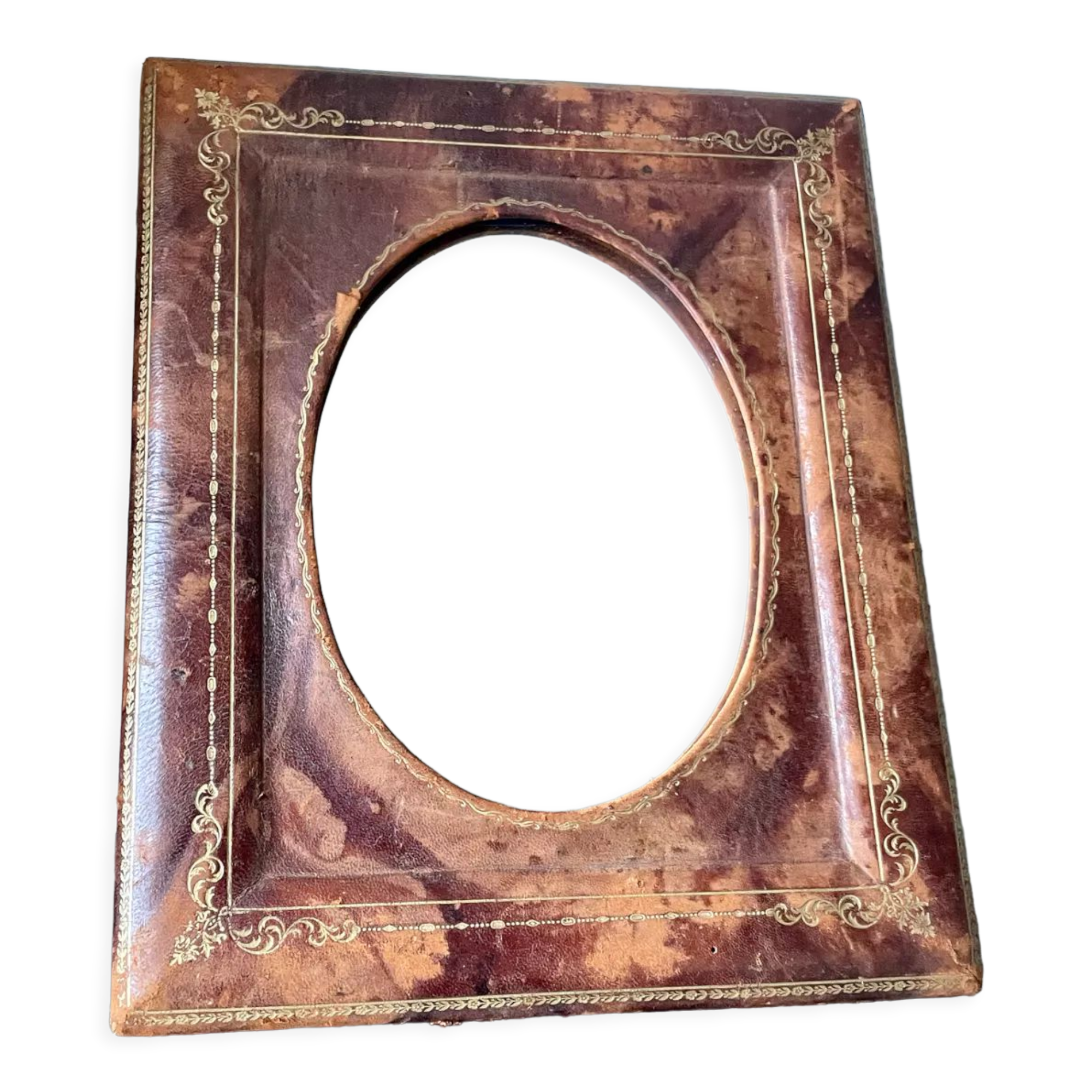 Antique leather framed mirror with gildings 30 cm x  24 cm