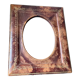 Antique leather framed mirror with gildings 30 cm x  24 cm
