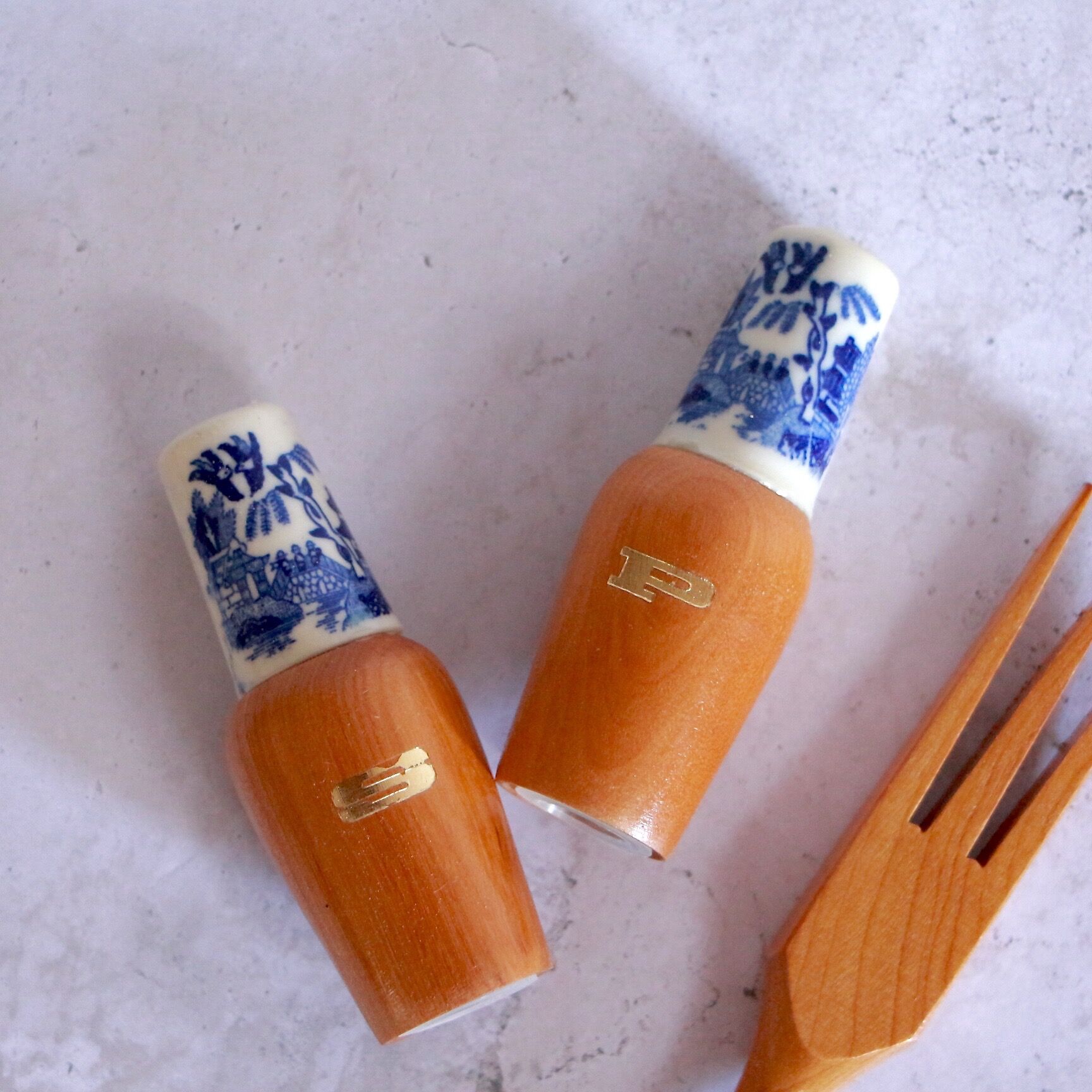 Set of wooden and ceramic salad cutlery