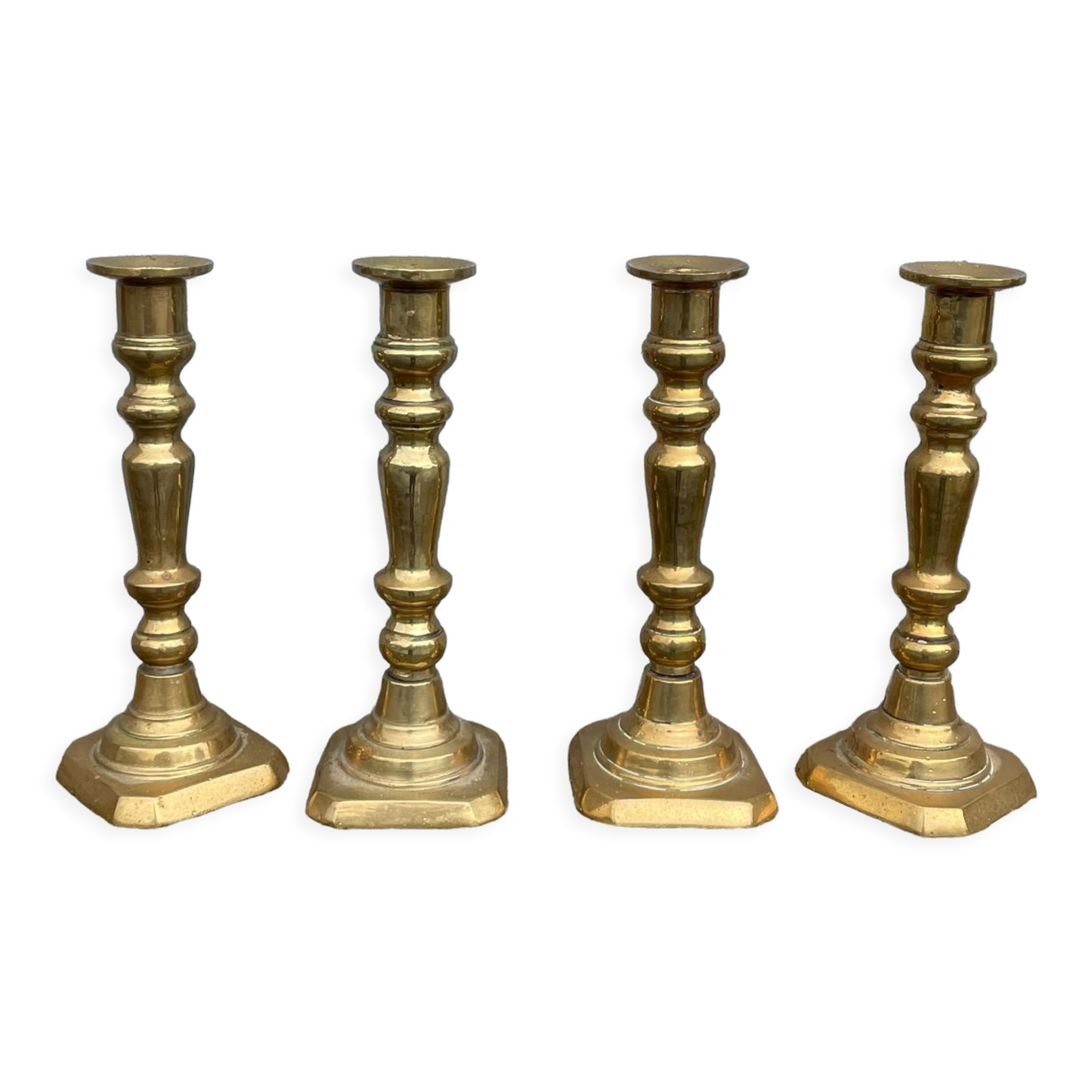 4 Victorian brass candlesticks