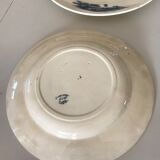 Two iron earth dishes