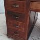 Vintage double-sided mahogany desk with 18 drawers.