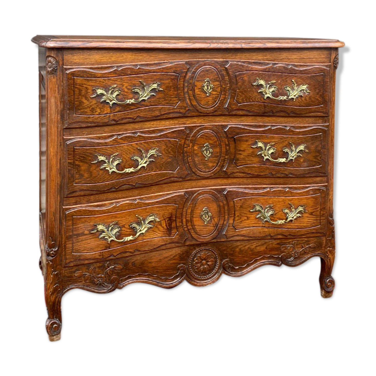 Louis XV style chest of drawers in natural wood nineteenth century