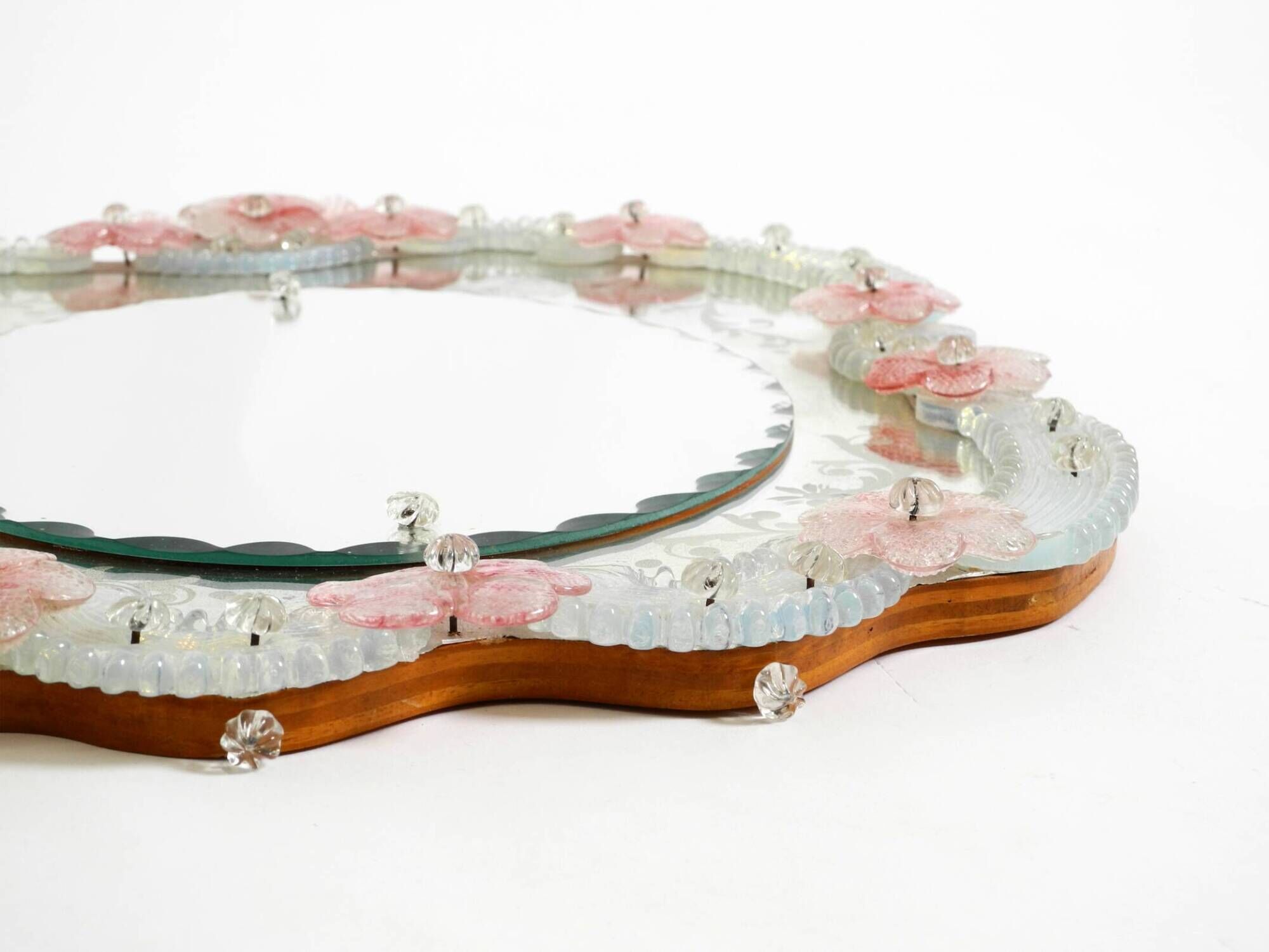 Italian mid-century wall mirror with a Murano glass frame and blossoms