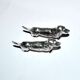 Set of 2 vintage animal knife rests, dachshund and basset hound, in silver-plated metal.