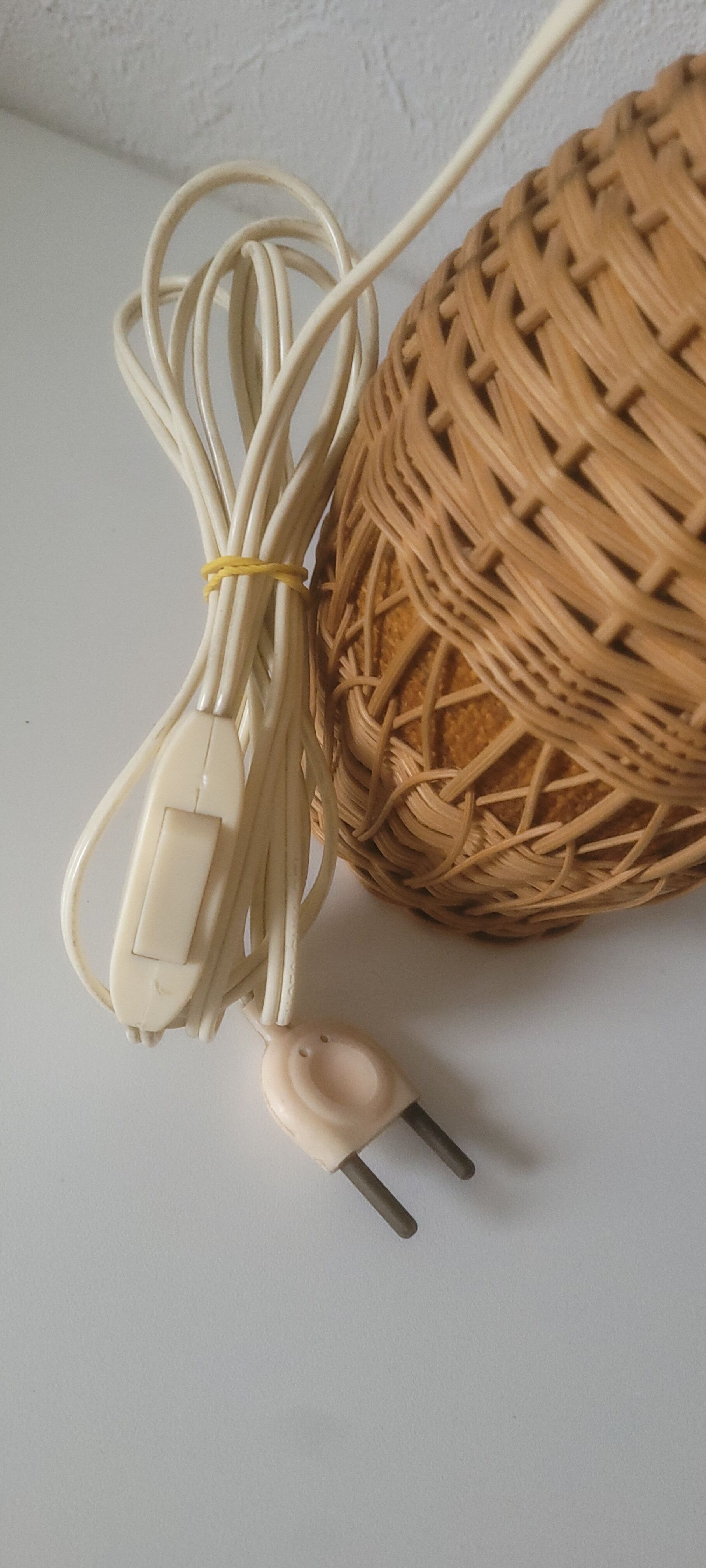 Vintage rattan lamp with yellow shade