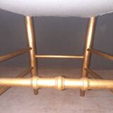 Pair of upholstered chairs in gilded wood