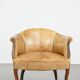 Antique sheep leather club chair/armchair on wheels