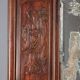 Antique mirror in exotic wood with chinoiserie carvings, 19th century.