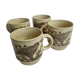 Ensemble de quatre mugs en grès émaillé à décor d'oiseau, made in england