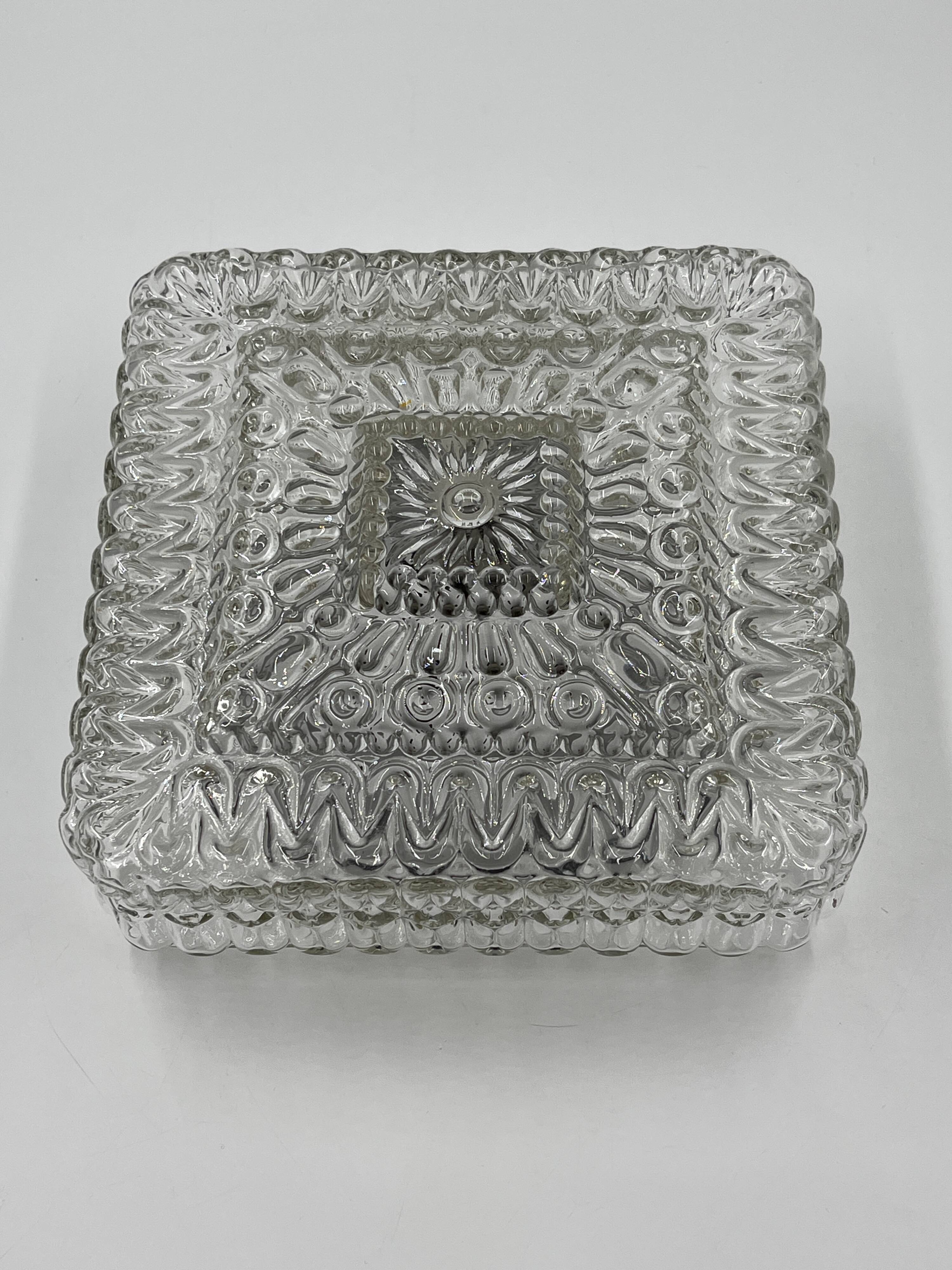 Square ceiling light in embossed molded glass