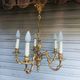 Antique gilded bronze chandelier in Louis XVI style, 5 lights, in working condition.