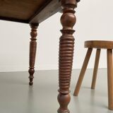 Walnut and pine drapery farmhouse table