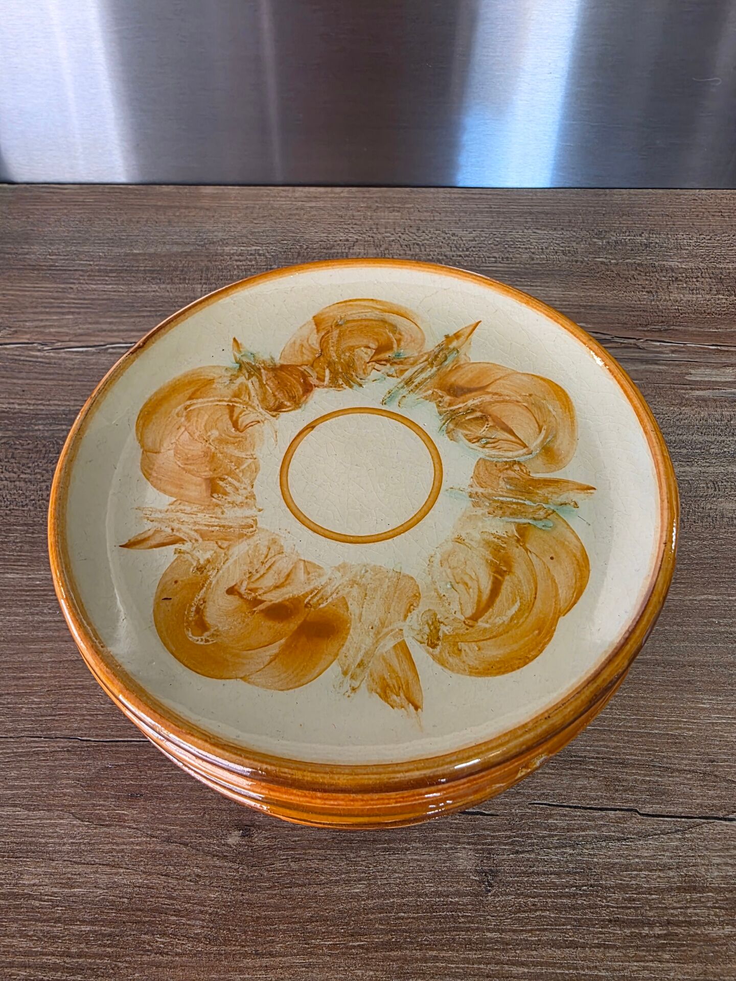 8 vintage dessert plates with a signed decoration.