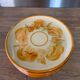 8 vintage dessert plates with a signed decoration.