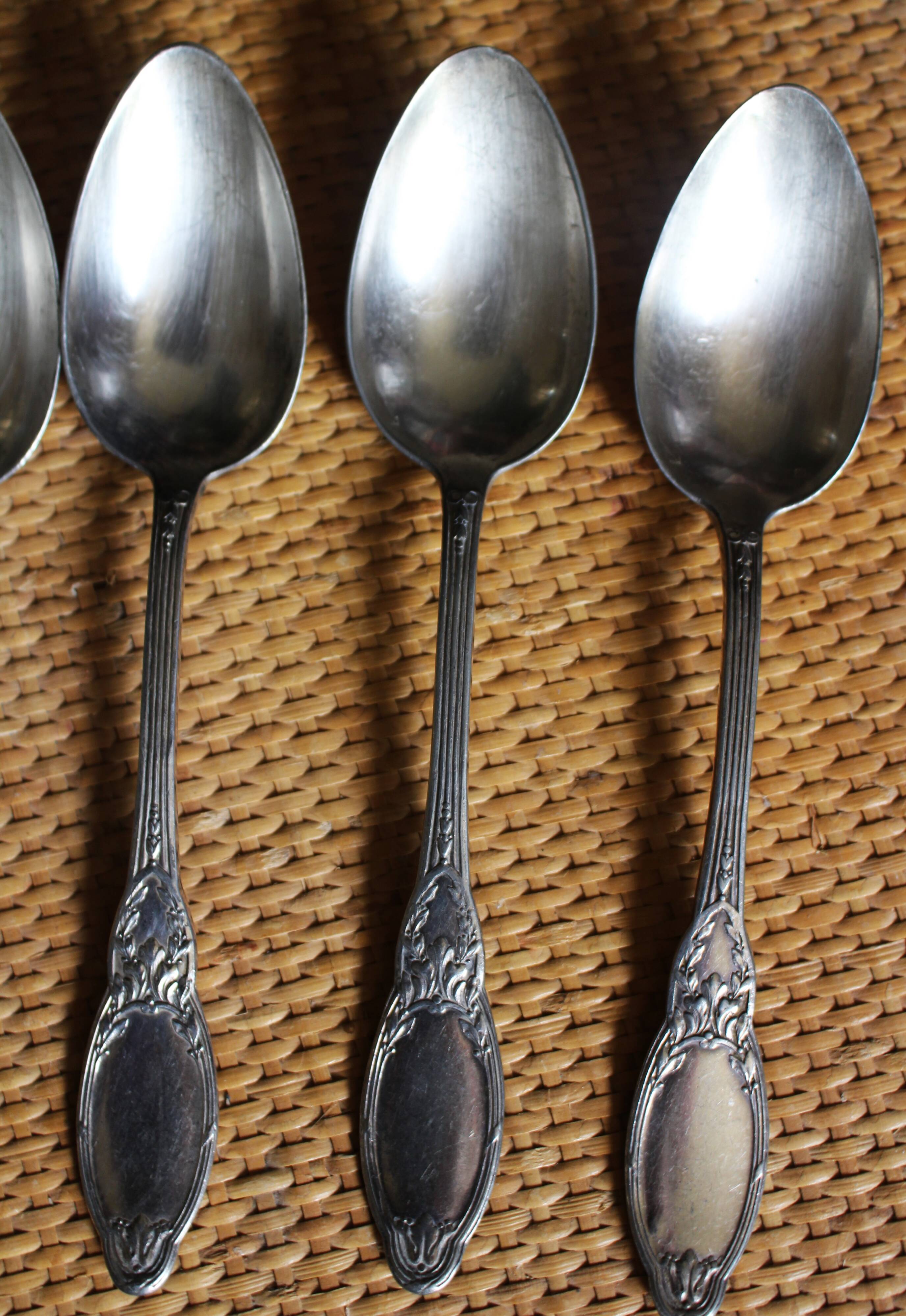 One of 6 silver-plated leafy metal soup spoons