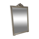 Large antique beveled mirror in carved wood painted with floral decoration and