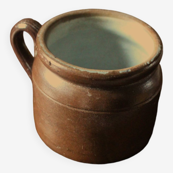 Small round terracotta pot with glazed interior handle