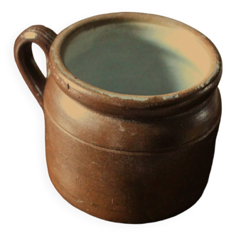Small round terracotta pot with glazed interior handle