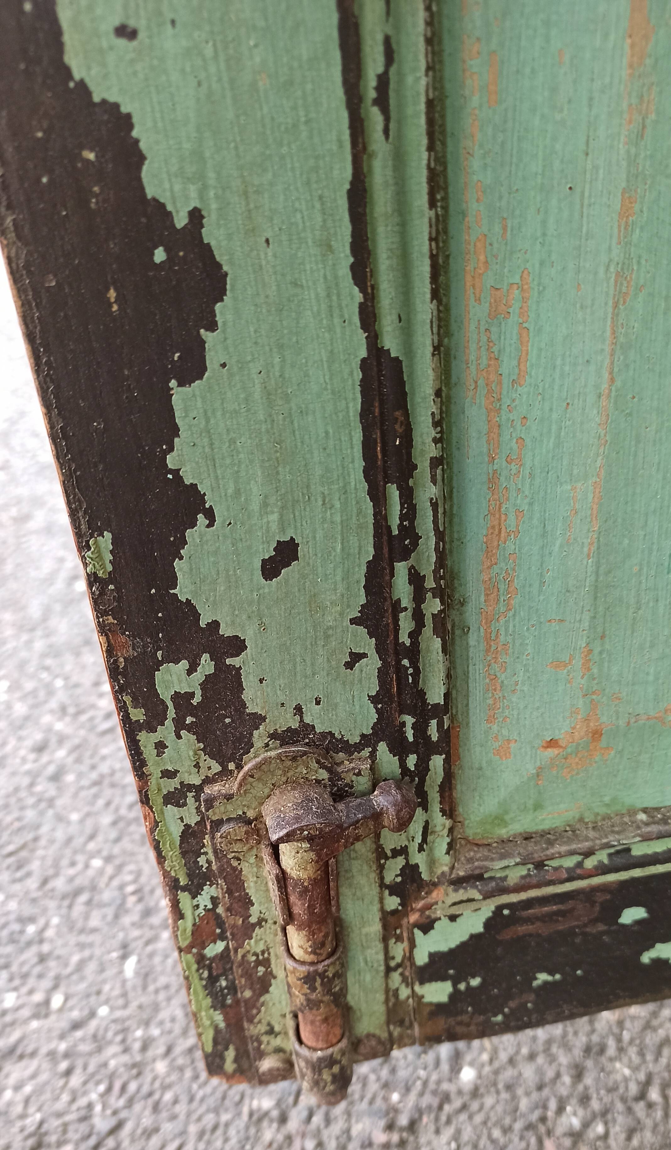 Old wooden cabinet with beautiful green patina