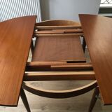 Extended round table in teak 60s