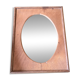 Bevelled oval mirror on oak frame
