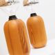 Pair of XXL Domus table lamps in marron wood with chrome globe bulbs