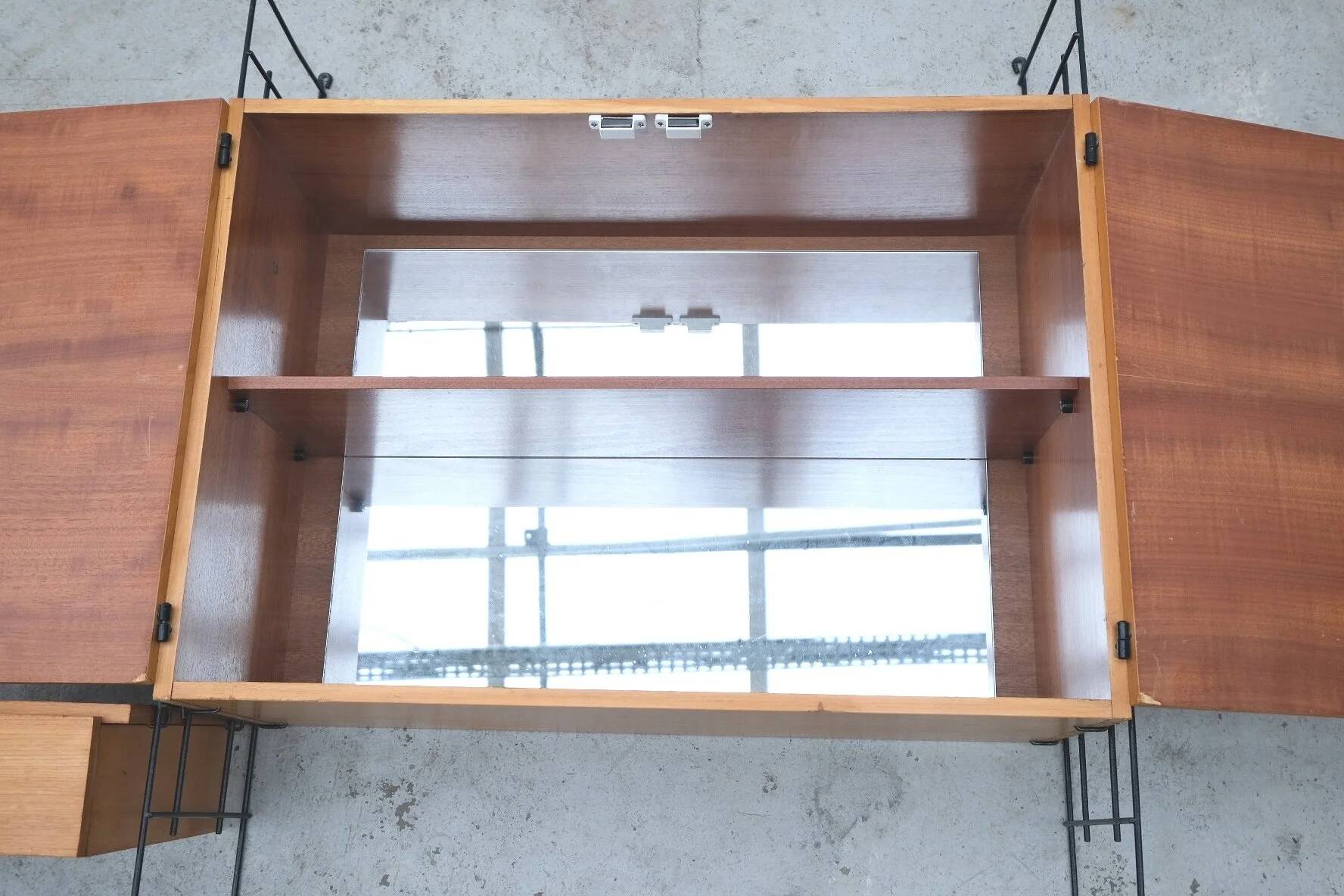 Wall-mounted bookcase in wood and metal, Germany 1960