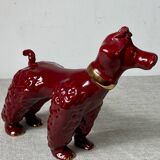 Burgundy and gold ceramic dog