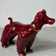 Chien en céramique bordeaux et doré