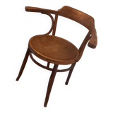 Curved wood armchair